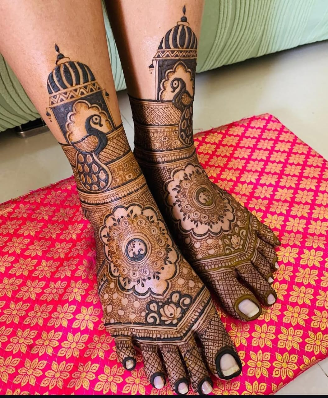 Detailed mehndi design on bride's feet