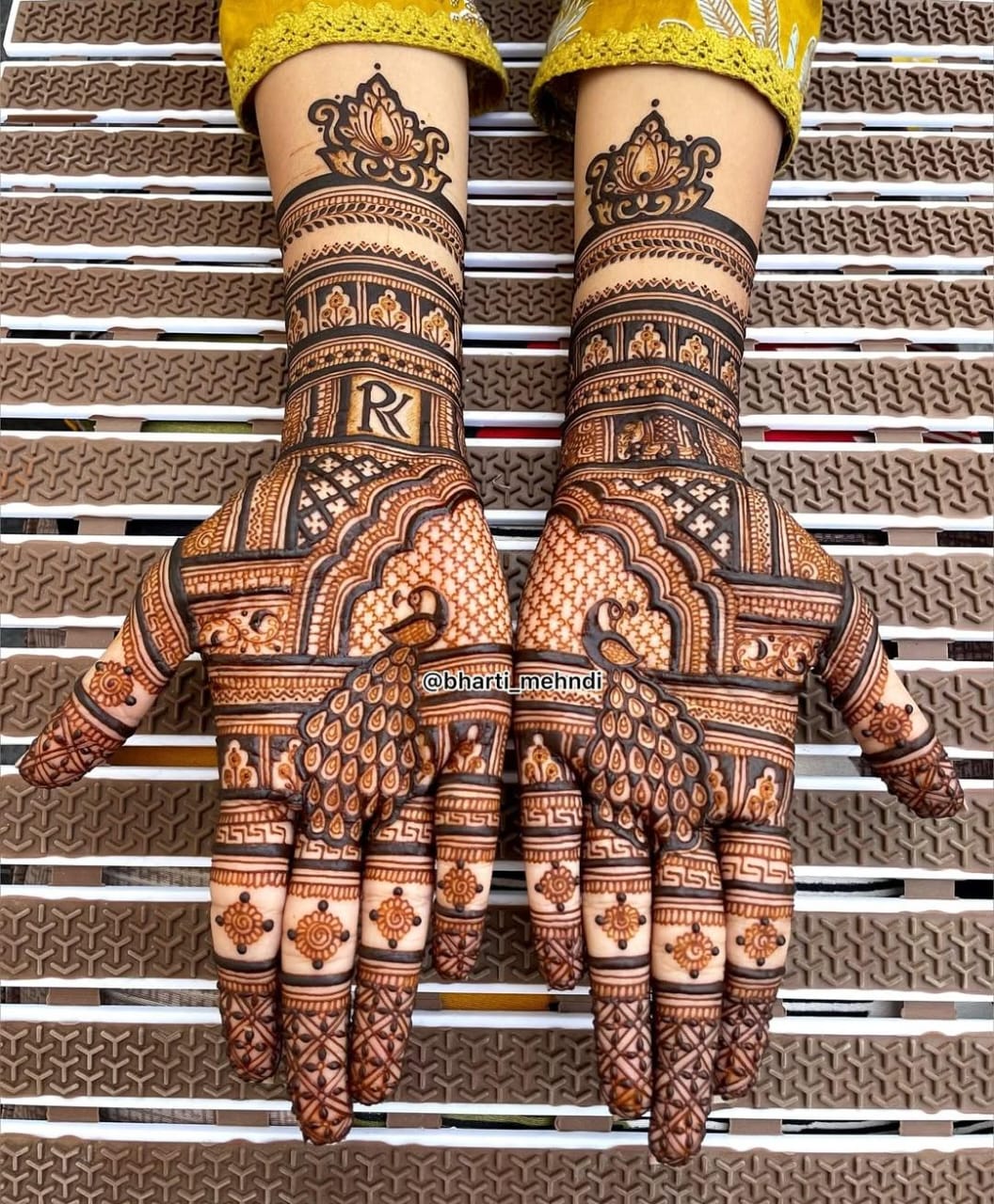 Engagement Mehndi design with intricate mandala patterns