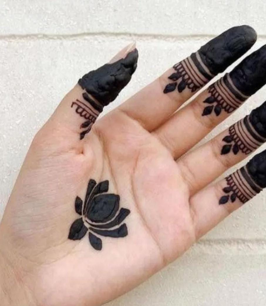 Engagement Mehndi design with heart motifs