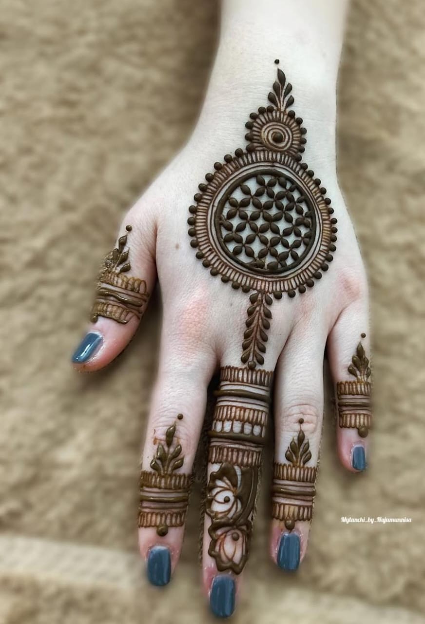 Engagement Mehndi design with geometric patterns
