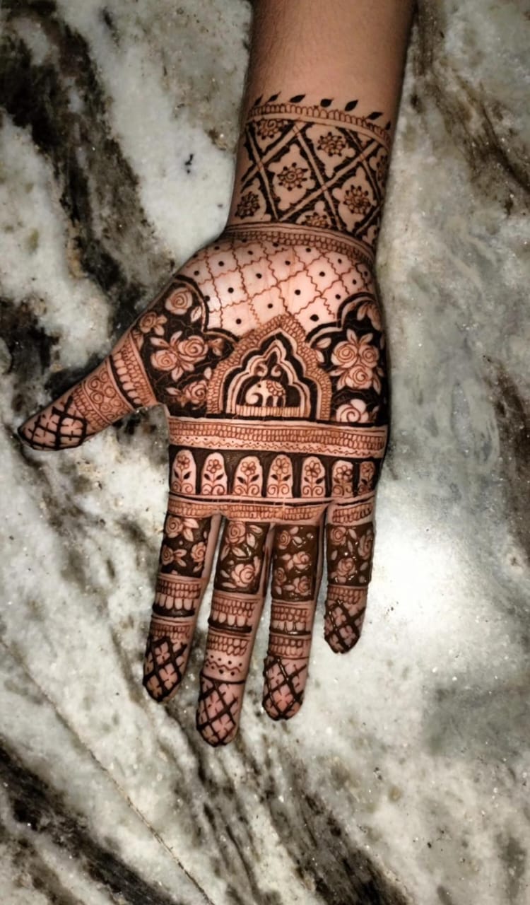 Intricate Rajasthani Mehndi design with floral patterns